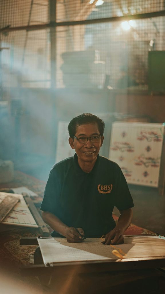 man in blue crew neck t-shirt wearing eyeglasses